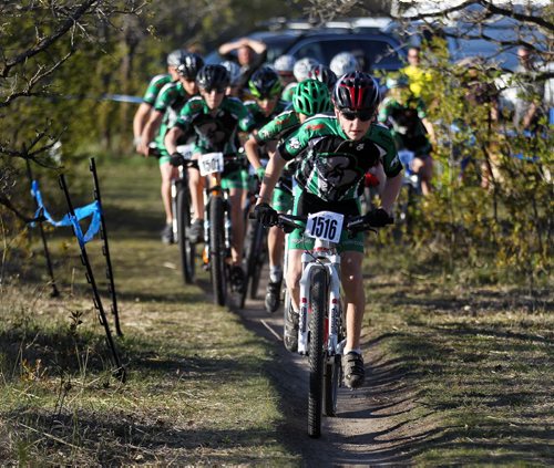 PHOTO FEATURE - Members of team Manitoba head out in the "expert" heat portion of the Wednesday evening mountain bike races at Birds Hill Bird's Hill Park. May 20, 2015 - (Phil Hossack / Winnipeg Free Press)