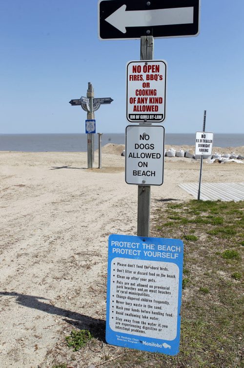 GIMLI BEACH -  No dogs are allowed on the beach. File shots of beach and board walk. BORIS MINKEVICH/WINNIPEG FREE PRESS May 22, 2015