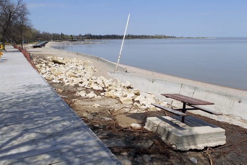 WINNIPEG BEACH -  Beach and board walk was further damaged by the big storm last weekend. Conservation was there putting up safety prevention stuff up. Workers did not want to give names. BORIS MINKEVICH/WINNIPEG FREE PRESS May 22, 2015