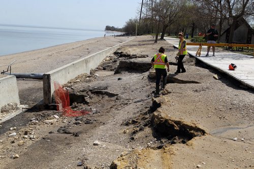 WINNIPEG BEACH -  Beach and board walk was further damaged by the big storm last weekend. Conservation was there putting up safety prevention stuff up. Workers did not want to give names. BORIS MINKEVICH/WINNIPEG FREE PRESS May 22, 2015