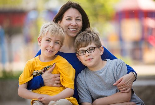 Mom Kerry Macdonald with her sons Levi (Ziggy) Ratchinsky, on the left, and Liam Ratchinsky. Levi, 6, and Liam, 10, go to Earl Grey School in Fort Rouge. 150522 - Friday, May 22, 2015 - (Melissa Tait / Winnipeg Free Press)