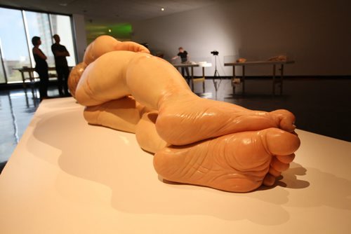Views of Ron Mueck's exhibit of a newborn baby  titled "A Girl",  which is startlingly large yet very life-like at the WAG Friday.  Mueck is a UK-based Austrailian artist that creates realistic yet enigmatic sculptures that portray humans at key stages in life, from birth through middle age, to death.  The works are either monumental in scale or undersized.  (feet)  May 22, 2015 Ruth Bonneville / Winnipeg Free Press