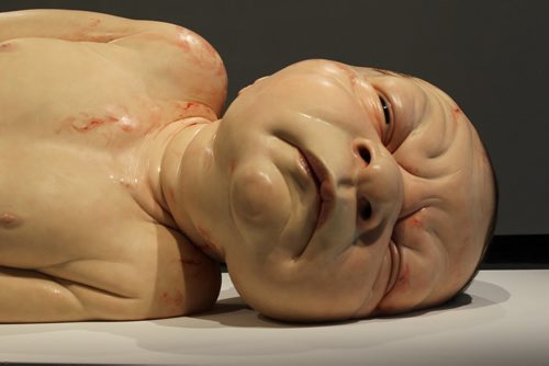 Views of Ron Mueck's exhibit of a newborn baby (face, head, neck)  titled "A Girl",   which is startlingly large yet very life-like at the WAG Friday.  Mueck is a UK-based Austrailian artist that creates realistic yet enigmatic sculptures that portray humans at key stages in life, from birth through middle age, to death.  The works are either monumental in scale or undersized.    May 22, 2015 Ruth Bonneville / Winnipeg Free Press