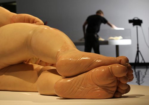Views of Ron Mueck's exhibit of a newborn baby (feet)  titled "A Girl",  which is startlingly large yet very life-like at the WAG Friday.  Mueck is a UK-based Austrailian artist that creates realistic yet enigmatic sculptures that portray humans at key stages in life, from birth through middle age, to death.  The works are either monumental in scale or undersized.    May 22, 2015 Ruth Bonneville / Winnipeg Free Press
