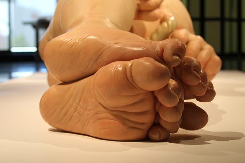 Views of Ron Mueck's exhibit of a newborn baby (feet)  titled "A Girl",  which is startlingly large yet very life-like at the WAG Friday.  Mueck is a UK-based Austrailian artist that creates realistic yet enigmatic sculptures that portray humans at key stages in life, from birth through middle age, to death.  The works are either monumental in scale or undersized.    May 22, 2015 Ruth Bonneville / Winnipeg Free Press