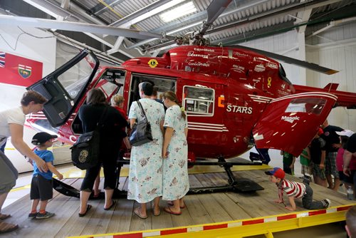 Visitors, pilots and nurses at the STARS hanger, Saturday, May 23, 2015. (TREVOR HAGAN/WINNIPEG FREE PRESS)