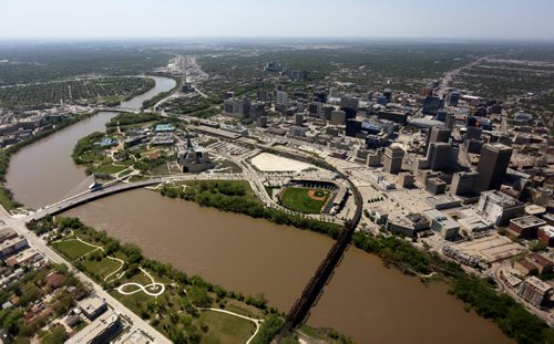 The Esplanade Riel, CMHR, The Forks, Shaw Park, and downtown, seen from the STARS Air Ambulance, Saturday, May 23, 2015. (TREVOR HAGAN/WINNIPEG FREE PRESS)
