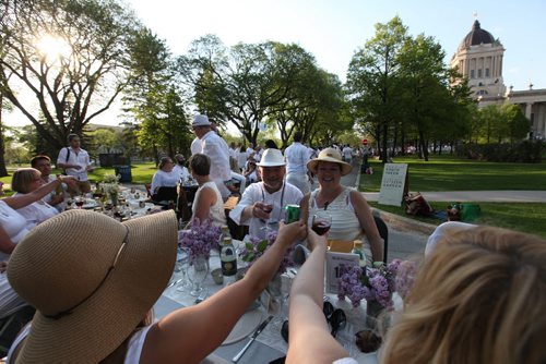 MYSTERY DINNER -Family and friends enjoy some laughs and a toast during the Table for 1201 event at the Leg Saturday night.   May 23, 2015 Ruth Bonneville / Winnipeg Free Press