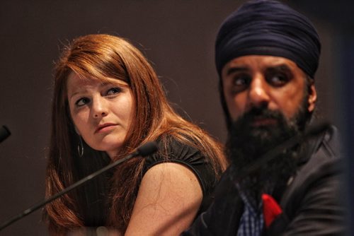 Local boxer Kristin Hudson (left) and Pardeep Singh Nagra during a panel discussion about boxing and human rights at the Bonnie & John Buhler Hall in the CMHR. Pardeep Singh Nagra fought and won the right to compete without shaving his beard.  150524 May 24, 2015 Mike Deal / Winnipeg Free Press