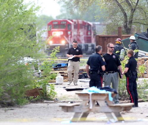 A man was badly injured from a explosion at Kens Carpets at 730 Archibald St Monday  Investigators survey explosion scene -Breaking News- May 25, 2015 ( Eds this is exclusive to FP- I have video)   (JOE BRYKSA / WINNIPEG FREE PRESS)¬