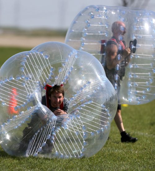 Barny Phelps and Neil Trudeau. Neil Trudeau runs River City Bubble Ball, a company that organizes bubble soccer, Saturday, May 23, 2015. (TREVOR HAGAN/WINNIPEG FREE PRESS) - for dave sanderson intersection 49.9 piece