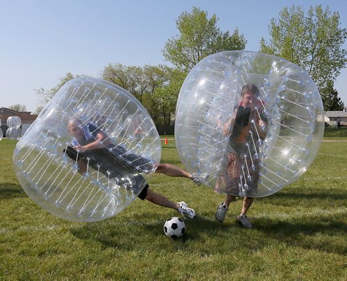 Players participate in Bubble Soccer. Neil Trudeau runs River City Bubble Ball, a company that organizes bubble soccer, Saturday, May 23, 2015. (TREVOR HAGAN/WINNIPEG FREE PRESS) - for dave sanderson intersection 49.9 piece