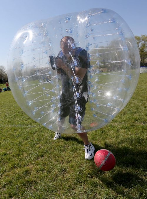 A bubble soccer player. Neil Trudeau runs River City Bubble Ball, a company that organizes bubble soccer, Saturday, May 23, 2015. (TREVOR HAGAN/WINNIPEG FREE PRESS) - for dave sanderson intersection 49.9 piece