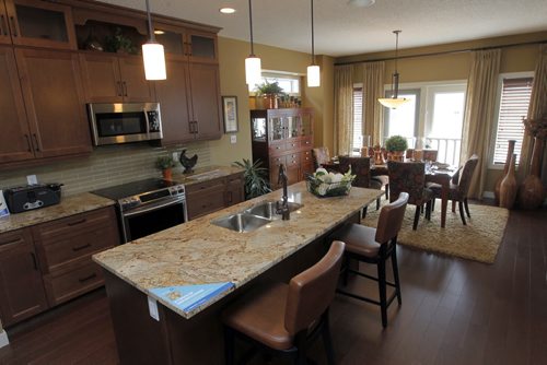 HOMES - 60 Dana Crescent in Amber Trails - Kitchen and dining room.  BORIS MINKEVICH/WINNIPEG FREE PRESS May 25, 2015