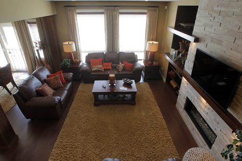 HOMES - 60 Dana Crescent in Amber Trails - rec living room.  BORIS MINKEVICH/WINNIPEG FREE PRESS May 25, 2015