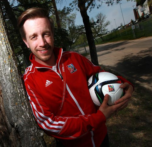 FIFA Winnipeg Venue GM Chad Falk, poses with an official event soccer ball Monday. Se Melissa Martin's story.  May 25, 2015 - (Phil Hossack / Winnipeg Free Press)