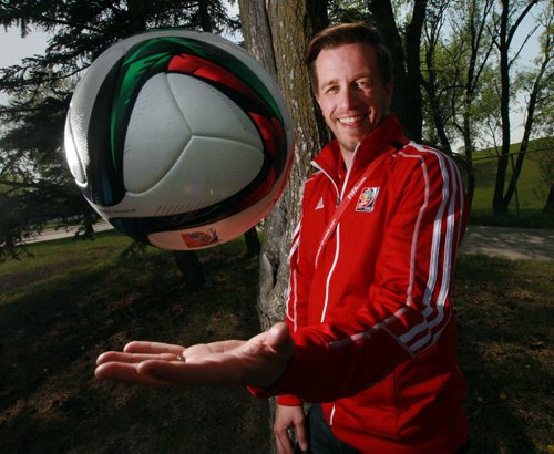 FIFA Winnipeg Venue GM Chad Falk, poses with an official event soccer ball Monday. Se Melissa Martin's story.  May 25, 2015 - (Phil Hossack / Winnipeg Free Press)