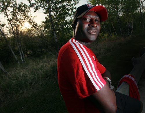 Niwi Akinwande, an international student living in Winnipeg, poses at CMU. He's volunteering for the 2015 FIFA Womens World Cup. See Melissa Martin's story. May 25, 2015 - (Phil Hossack / Winnipeg Free Press)