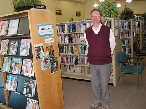 Canstar Community News May 19, 2015 - Percy Gregoire, head librarian, has worked at the Portage Regional Library for 39 years and seen many technological changes in that time. (ANDREA GEARY/CANSTAR COMMUNITY NEWS)