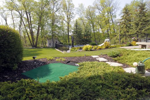 35 Stormont Drive in St. Norbert. Realtor Glen MacAngus listing.  Basement walk out view. BORIS MINKEVICH/WINNIPEG FREE PRESS May 26, 2015