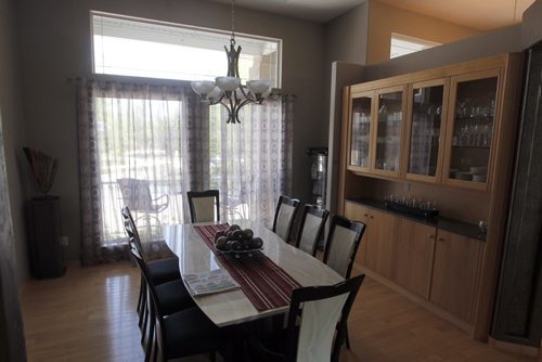 35 Stormont Drive in St. Norbert. Realtor Glen MacAngus listing.  Dining room. BORIS MINKEVICH/WINNIPEG FREE PRESS May 26, 2015