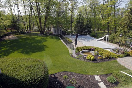 35 Stormont Drive in St. Norbert. Realtor Glen MacAngus listing.  View of backyard. Pool cover on. BORIS MINKEVICH/WINNIPEG FREE PRESS May 26, 2015