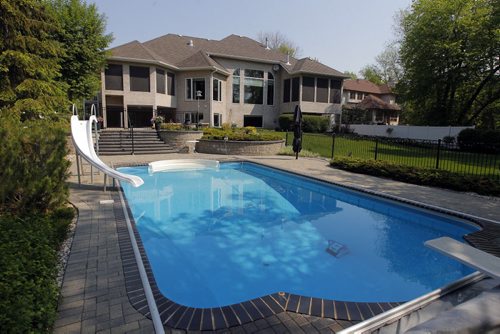 35 Stormont Drive in St. Norbert. Realtor Glen MacAngus listing.  Backyard pool. BORIS MINKEVICH/WINNIPEG FREE PRESS May 26, 2015