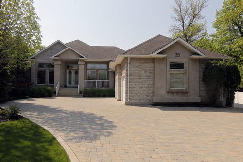 35 Stormont Drive in St. Norbert. Realtor Glen MacAngus listing.  3 car garage.  BORIS MINKEVICH/WINNIPEG FREE PRESS May 26, 2015