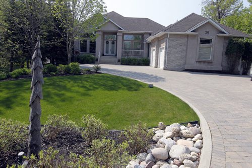 35 Stormont Drive in St. Norbert. Realtor Glen MacAngus listing.  3 car garage.  BORIS MINKEVICH/WINNIPEG FREE PRESS May 26, 2015