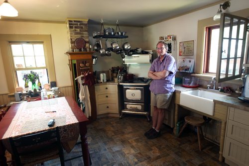 Selkirk, Manitoba- Open Doors tour in Selkirk, Manitoba and surrounding communities- Selkirks oldest home- Colcleugh Hou-se-102 Pacific Ave- current owner journalist George Stephenson  in his kitchen- See Bill Redekop story- May 26, 2015   (JOE BRYKSA / WINNIPEG FREE PRESS)