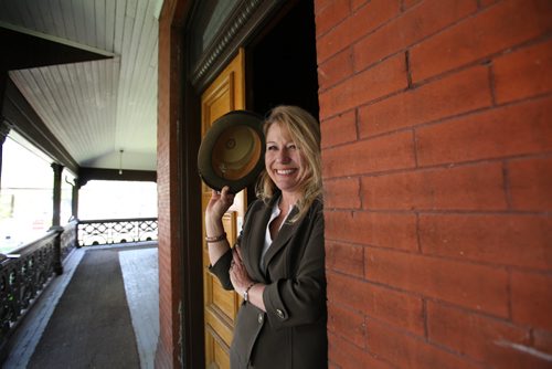 ENT: Cindy Tugwell, Executive Director, Heritage Winnipeg, is excited as she stands in the doorway of the soon to be re-opened, Dalnavert Museum which will be just one of the five heritage sites in Wpg open to the public for viewing during the annual "Doors Open Winnipeg"  event taking place this weekend.  Dalnavet museum, a historic Victorian home of the former Manitoba Premier, Hugh John MacDonald, was closed to the public in Sept of 2013 but will be reopened permanently following event.  May 27, 2015 Ruth Bonneville / Winnipeg Free Press