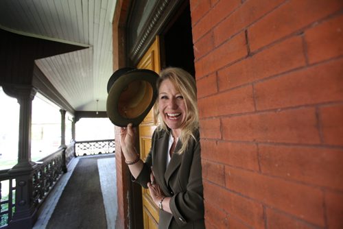 ENT: Cindy Tugwell, Executive Director, Heritage Winnipeg, is excited as she stands in the doorway of the soon to be re-opened, Dalnavert Museum which will be just one of the five heritage sites in Wpg open to the public for viewing during the annual "Doors Open Winnipeg"  event taking place this weekend.  Dalnavet museum, a historic Victorian home of the former Manitoba Premier, Hugh John MacDonald, was closed to the public in Sept of 2013 but will be reopened permanently following event.  May 27, 2015 Ruth Bonneville / Winnipeg Free Press