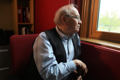 Theodore Fontaine, attends the former Assiniboine Residential School ( Assiniboia Residential School) at 611 Academy that he went to in the late 1950's, now it is, ironically, the Canadian Centre for Child Protection. Fontaine spends  time looking out the window of his former classroom and on the stairwell he climbed many times while attending the school. and perusing a archival class photo with him and his classmates  from 1958. See Catherine Mitchell story.   May 28, 2015 Ruth Bonneville / Winnipeg Free Press