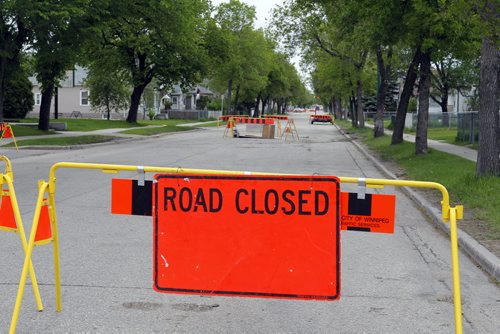 SINK HOLE ON ARLINGTON - Road closed between Ellice and Sargent. BORIS MINKEVICH/WINNIPEG FREE PRESS May 29, 2015