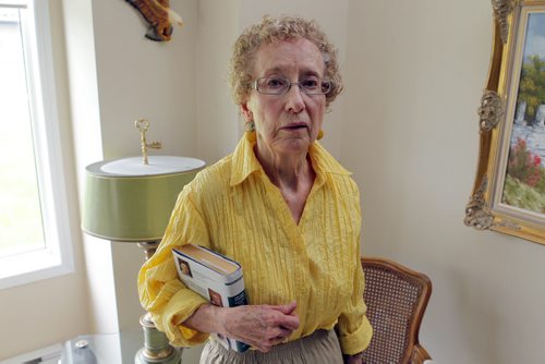 Dorothy Tacium, who is 85, spent 40 years volunteering every Friday afternoon in the library at Niakwa Place School. She "retired" from volunteering at the school a year ago. BORIS MINKEVICH/WINNIPEG FREE PRESS May 29, 2015