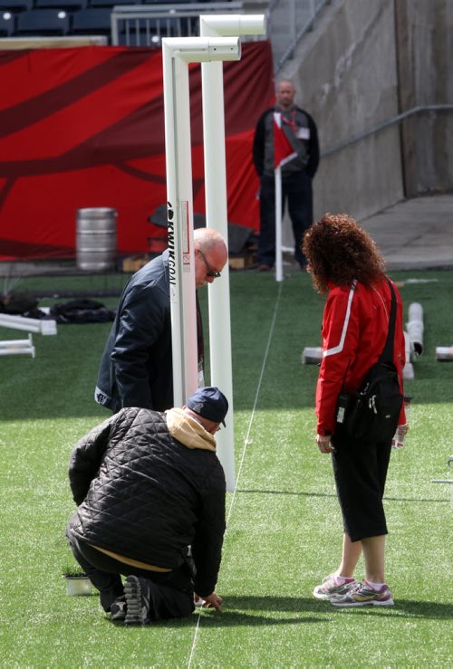 Installing a goal on the field of Investors Group Field in preparation for FIFA Womens World Cup in Winnipeg-See Melissa Martin story- May 29, 2015   (JOE BRYKSA / WINNIPEG FREE PRESS)