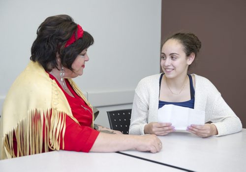 150529 DAVID LIPNOWSKI / WINNIPEG FREE PRESS (May 29, 2015)  Gray Academy of Jewish Education grade 10 student Nicole Margolis (right) with medium and aboriginal spirit walker Mary Wilson.  Grade 10 teacher Barbera Buffie assigned her class to interview "fearless" individuals in Winnipeg that she believed the students would learn from and be inspired by.  FOR Sinclair column