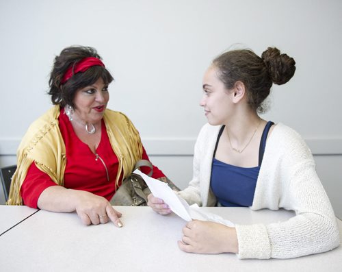 150529 DAVID LIPNOWSKI / WINNIPEG FREE PRESS (May 29, 2015)  Gray Academy of Jewish Education grade 10 student Nicole Margolis (right) with medium and aboriginal spirit walker Mary Wilson.  Grade 10 teacher Barbera Buffie assigned her class to interview "fearless" individuals in Winnipeg that she believed the students would learn from and be inspired by.  FOR Sinclair column