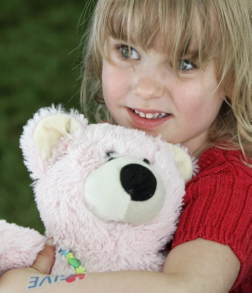 Emily Campbell, 3, with her teddy bear at the Teddy Bears' Picnic at Assiniboine Park. The event brings around 30,000 people to the park, mostly kids with their stuffed toys that are damaged and need fixing. The money raised goes towards the Childrens Hospital Foundation of Manitoba.  150531 May 31, 2015 Mike Deal / Winnipeg Free Press