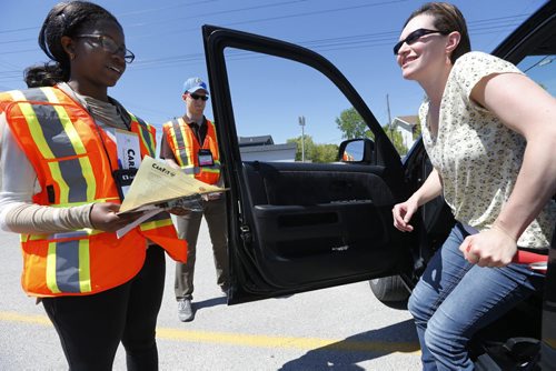 May 31, 2015 - 150531  -  Jane Nzeribe and Jeff Boniface, occupational therapists and CarFit technicians, instruct Julia Couture on safety while driving her car Sunday, May 31, 2015 at CAA Manitoba's St. Annes location. CAA Manitoba and the Canadian Association of Occupational Therapists (CAOT) have teamed up to host the first-ever CarFit event, aiming to keep maturing drivers behind the wheel, while keeping safety in mind. John Woods / Winnipeg Free Press