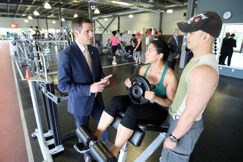 Mayor Brian Bowman talks to workout partners Regyn Guinto and Alex Ferrer at Cindy Klassen Recreation Complex. Announcement recognizing National Health and Fitness Day on Saturday, June 6. . Bowman was touring the facilities. BORIS MINKEVICH/WINNIPEG FREE PRESS June 1st, 2015