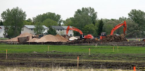Land zoned "agricultural" in the map provided by Bart already under construction for development, here along the west perimeter north of Wilkes beside the Rae Trail. See Bart Kives story re:City agricultural land. June 1, 2015 - (Phil Hossack / Winnipeg Free Press)