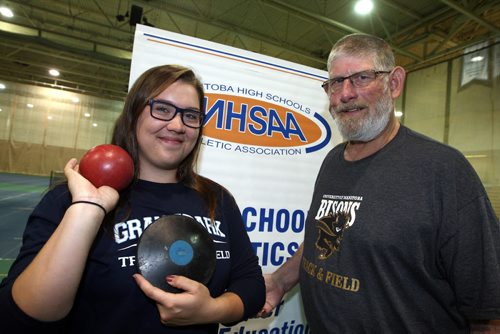 THE 2015 MILK PROVINCIAL HIGH SCHOOL TRACK & FIELD CHAMPIONSHIP. Meet is this weekend. Preview press conference. Max Bell Centre.  (right) Coach Bruce Pirnie with star athlete (left) Taylor Heald. Shot put, discus, javelin. BORIS MINKEVICH/WINNIPEG FREE PRESS June 2, 2015