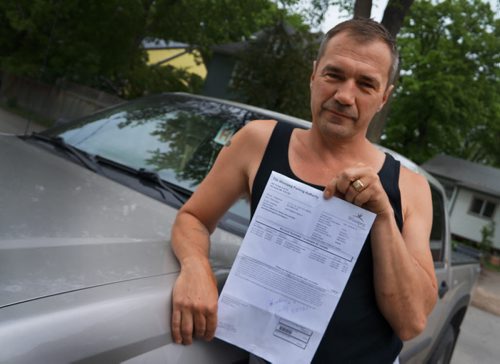 Leonard Kies received an invoice for three outstanding parking tickets from 1996 on Friday. He doesn't remember them and wonders why the city took 19 years to send a reminder his way. (Jessica Botelho-Urbanski / Winnipeg Free Press)