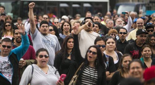 Survivors, descendants, and supporters joined the Walk for Reconciliation on Tuesday, June 2, 2015.  The march went through downtown from the University of Winnipeg, and finished at the Thunderbird House for a feast and pipe ceremony. Mikaela MacKenzie / Winnipeg Free Press