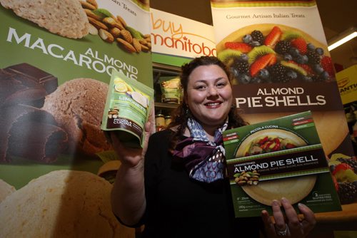 BIZ - Pina Romolo (in photo) and her mother have an Italian cookie company called Piccola Cucina which was recently featured as one of the ten new Canadian companies on the rise. The cookies have recently been added to Co-Op shelves and she is a doing a demo at the store today. BORIS MINKEVICH/WINNIPEG FREE PRESS June 2, 2015