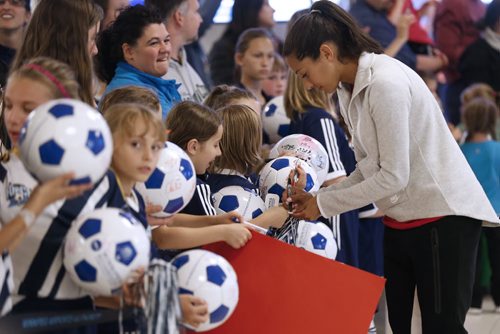 June 2, 2015 - 150602  -  Christen Press meets childrens soccer teams came to support team USA as they arrived in Winnipeg for the World Cup Tuesday, June 2, 2015. John Woods / Winnipeg Free Press