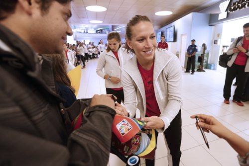 June 2, 2015 - 150602  - Lauren Holiday meets childrens soccer teams came to support team USA as they arrived in Winnipeg for the World Cup Tuesday, June 2, 2015. John Woods / Winnipeg Free Press