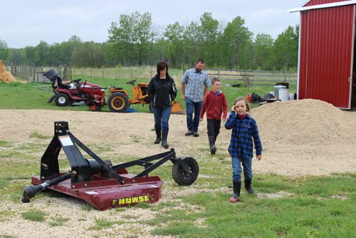 Modern homesteaders festival coming in Fraserwood  065 - 069 Percy family walking in from their farm yard near Fraserwood in the Interlake. Noah and Hannah in front, followed by parents Adrienne and Trevor.  BILL REDEKOP/WINNIPEG FREE PRESS May 29, 2015