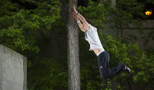 Marc Selby does parkour at the University of Manitoba  campus on Wednesday, June 3, 2015.  "It's like going out and playing," says Selby. Mikaela MacKenzie / Winnipeg Free Press